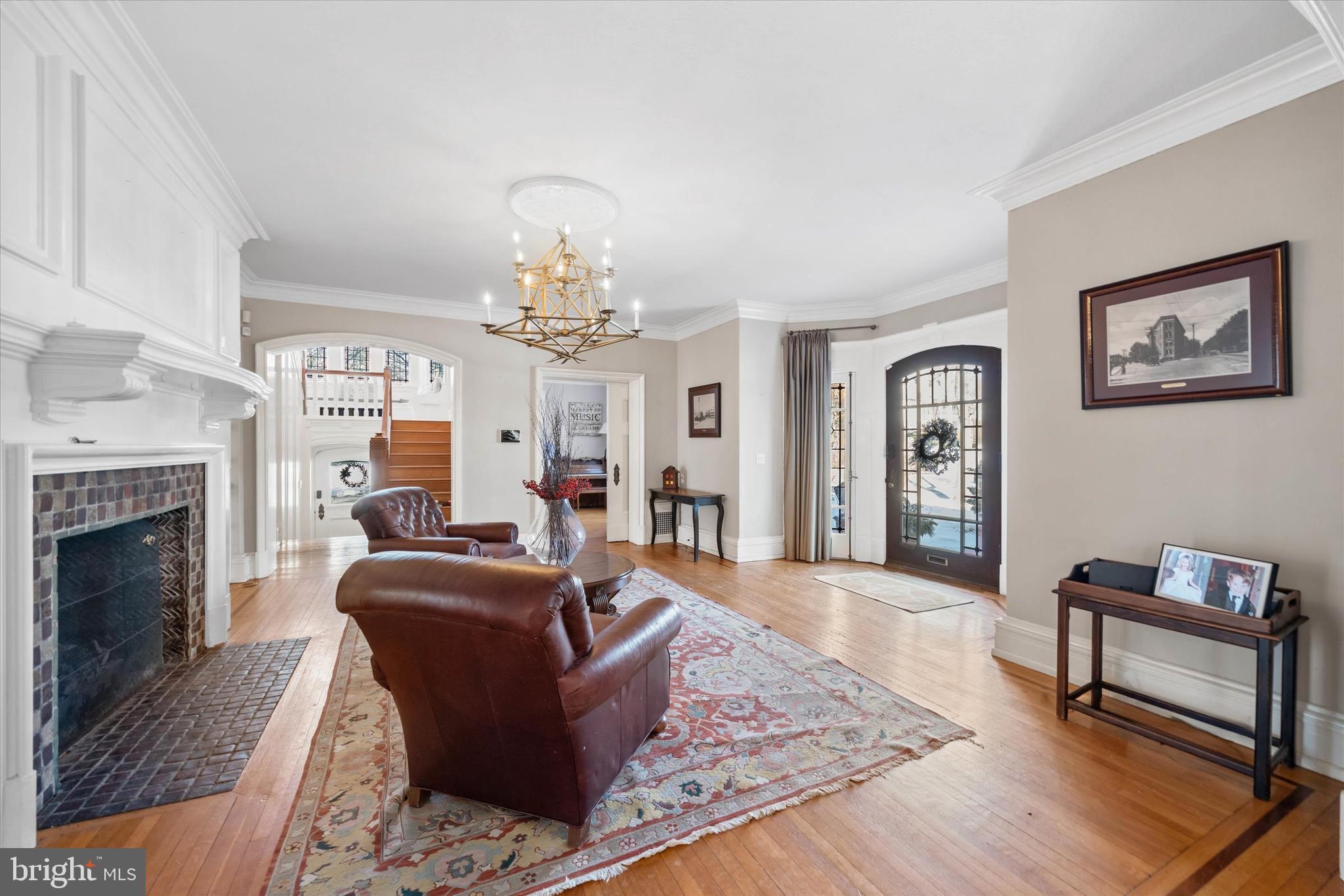 2412 Delaware Avenue Wilmington, DE 19806 - Photo 4 of 64 a living room with furniture and a fireplace