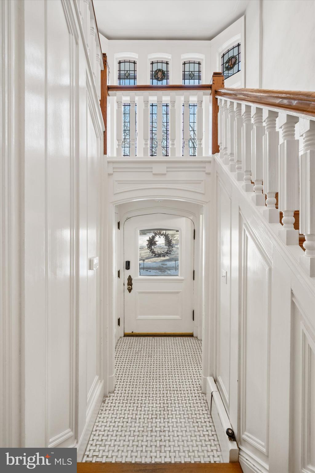 2412 Delaware Avenue Wilmington, DE 19806 - Photo 49 of 64 a view of a hallway with entryway wooden floor and front door
