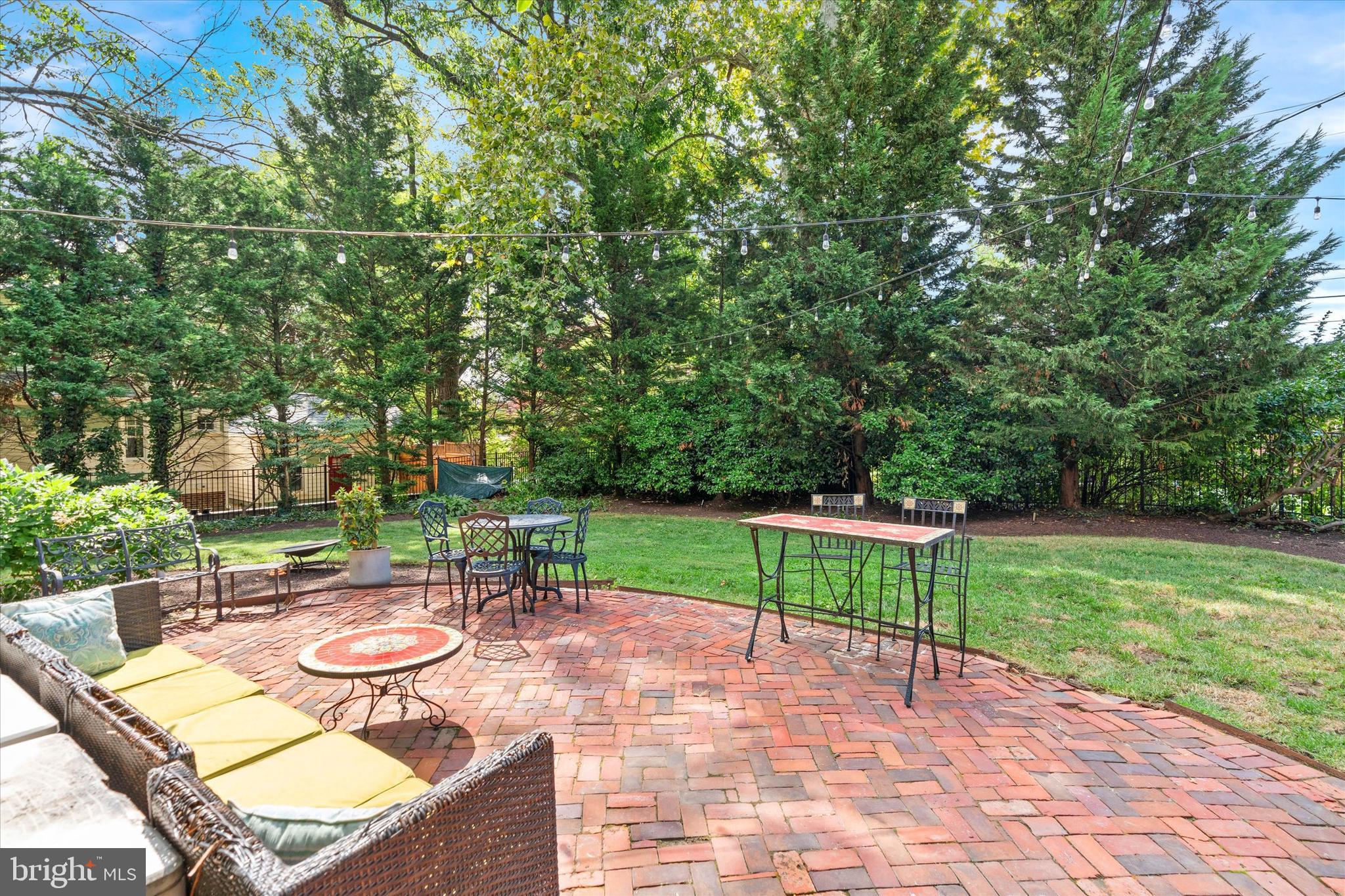 2412 Delaware Avenue Wilmington, DE 19806 - Photo 62 of 64 a view of a patio with a table chairs and a backyard