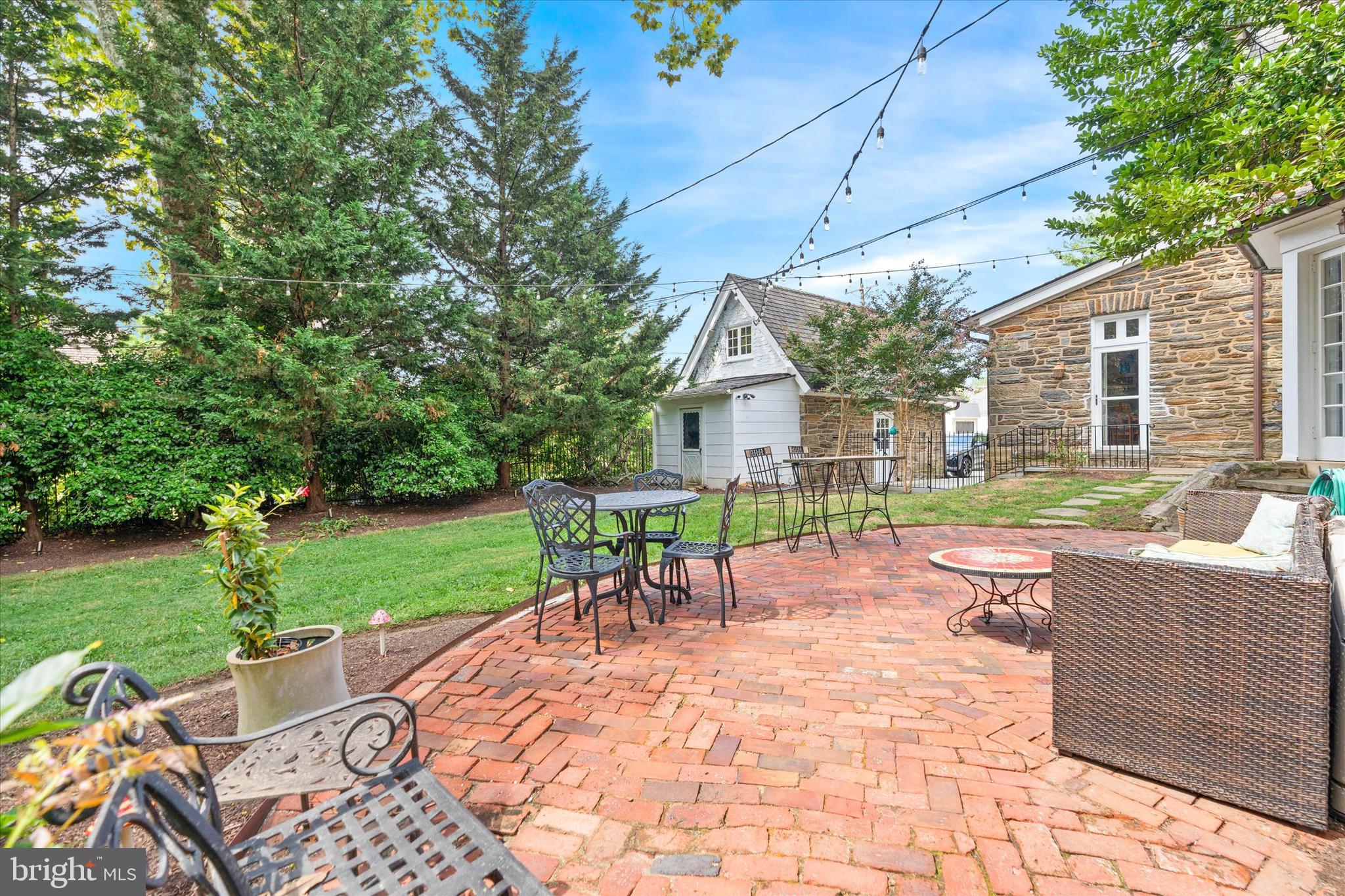 2412 Delaware Avenue Wilmington, DE 19806 - Photo 63 of 64 a view of a patio with a table chairs and a backyard