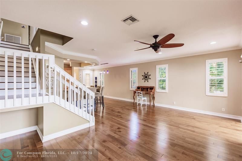 116 Southeast Crestwood Circle Stuart, FL 34997 - Photo 13 of 48 a view of livingroom with furniture and wooden floor
