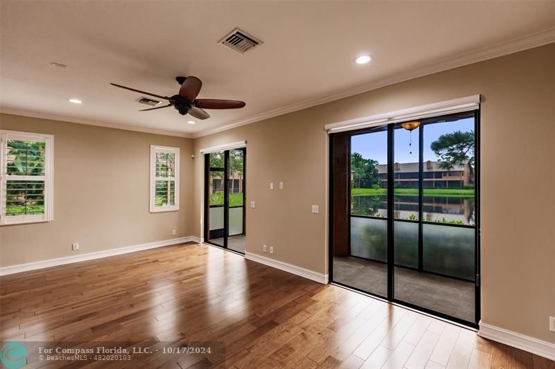 116 Southeast Crestwood Circle Stuart, FL 34997 - Photo 16 of 48 a view of a livingroom with a ceiling fan and window