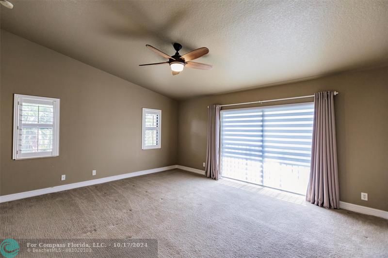 116 Southeast Crestwood Circle Stuart, FL 34997 - Photo 23 of 48 a view of an empty room with a window