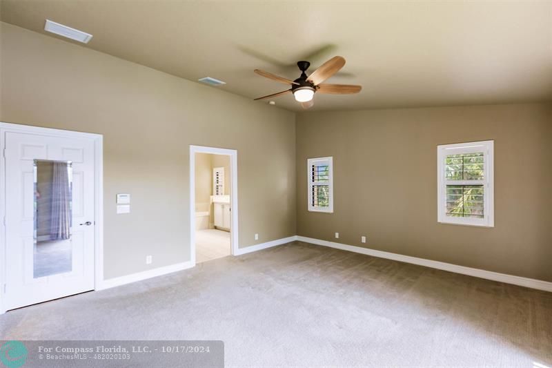 116 Southeast Crestwood Circle Stuart, FL 34997 - Photo 26 of 48 a view of an empty room with a window
