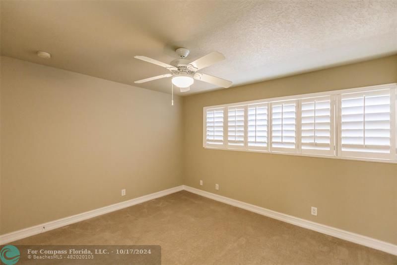 116 Southeast Crestwood Circle Stuart, FL 34997 - Photo 33 of 48 an empty room with a window