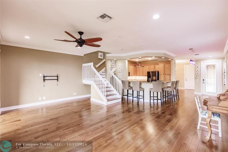 116 Southeast Crestwood Circle Stuart, FL 34997 - Photo 4 of 48 a view of a a dining room with furniture window and wooden floor