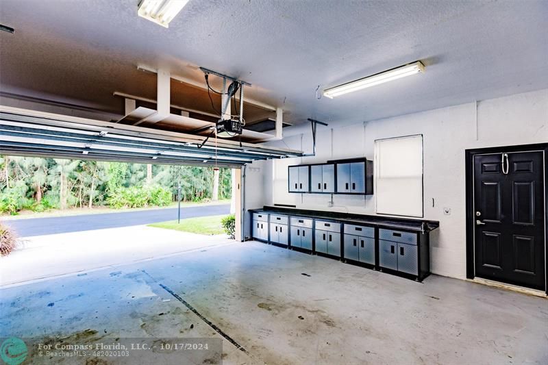116 Southeast Crestwood Circle Stuart, FL 34997 - Photo 44 of 48 a view of kitchen with furniture and large window