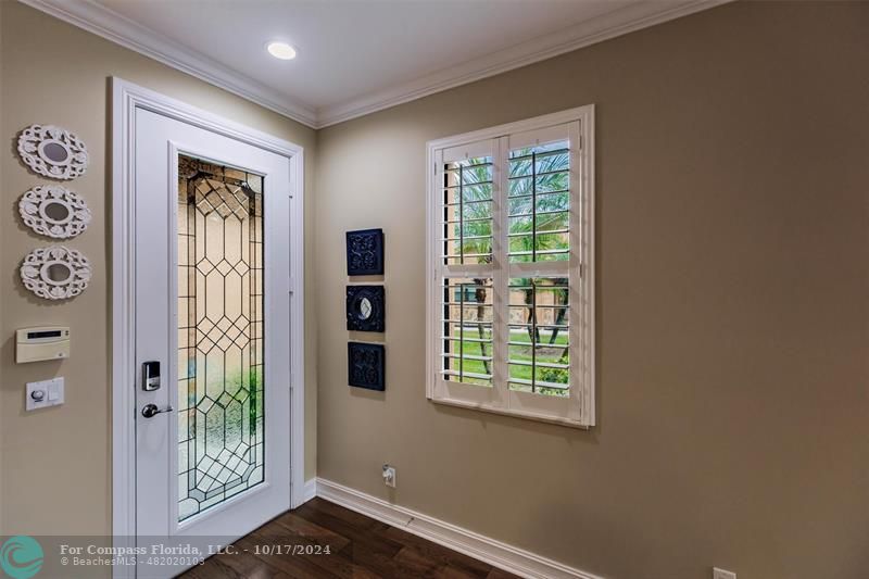 116 Southeast Crestwood Circle Stuart, FL 34997 - Photo 9 of 48 an empty room with windows