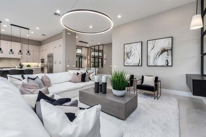 17166 Ludovica Lane Boca Raton, FL 33496 - Photo 3 of 24 a living room with furniture and kitchen view