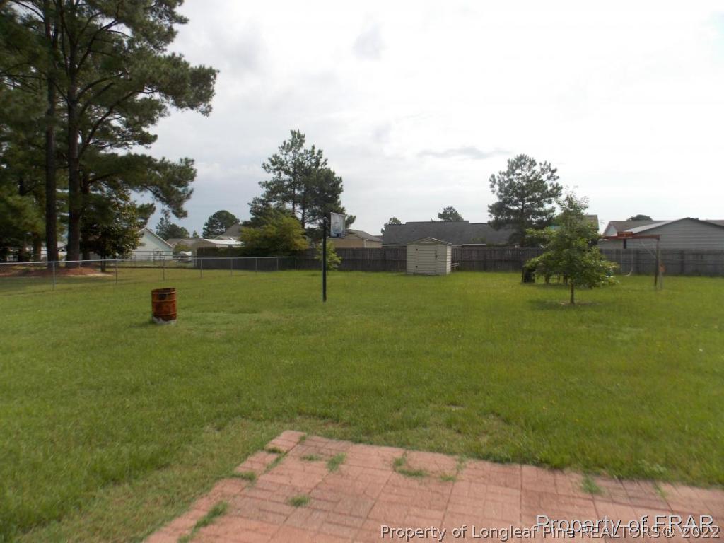 10071 Rockfish Road Raeford, NC 28376 - Photo 14 of 15 a view of an outdoor space and yard