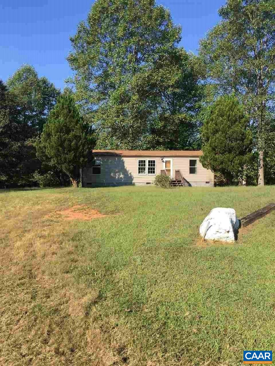 626 Celt Road Stanardsville, VA 22973 - Photo 1 of 7 a view of a house with yard and sitting area