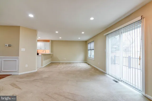 a kitchen with a sink stove and microwave