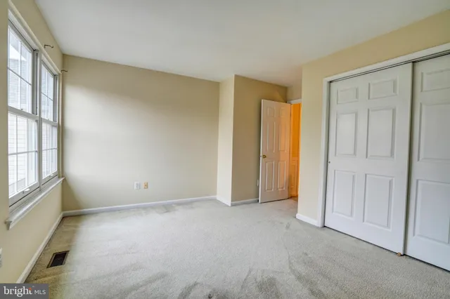 an empty room with windows