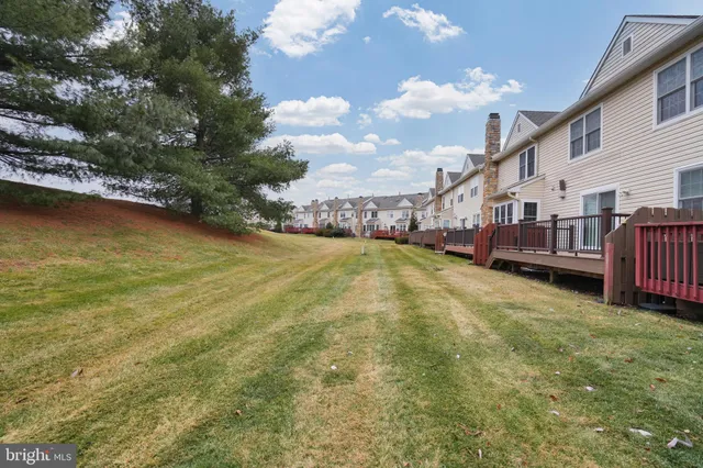 a view of deck with wooden floor and fence