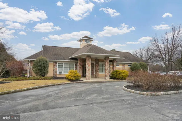 a view of an outdoor space and tennis court