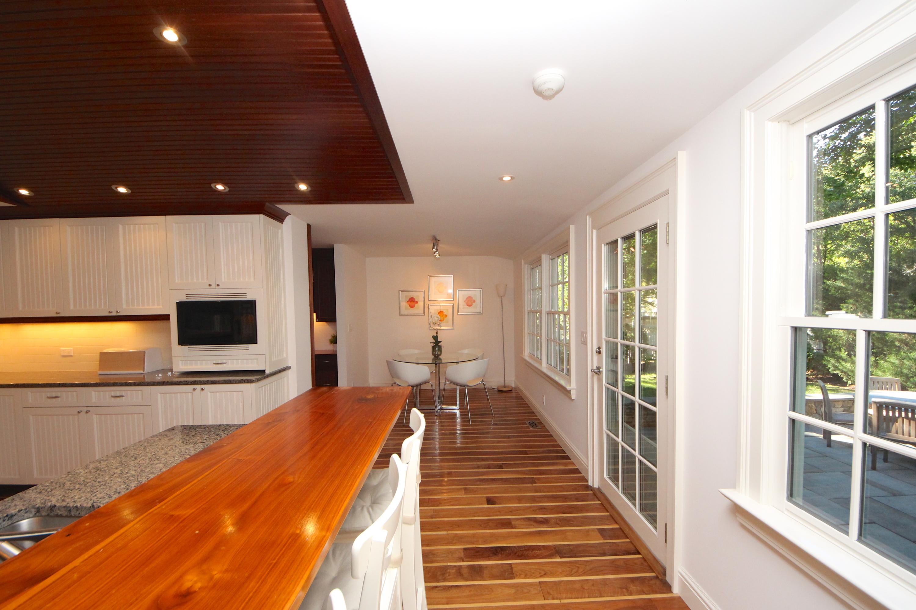 33 Intervale Road Darien, CT 06820 - Photo 10 of 28 a room with wooden floor and windows