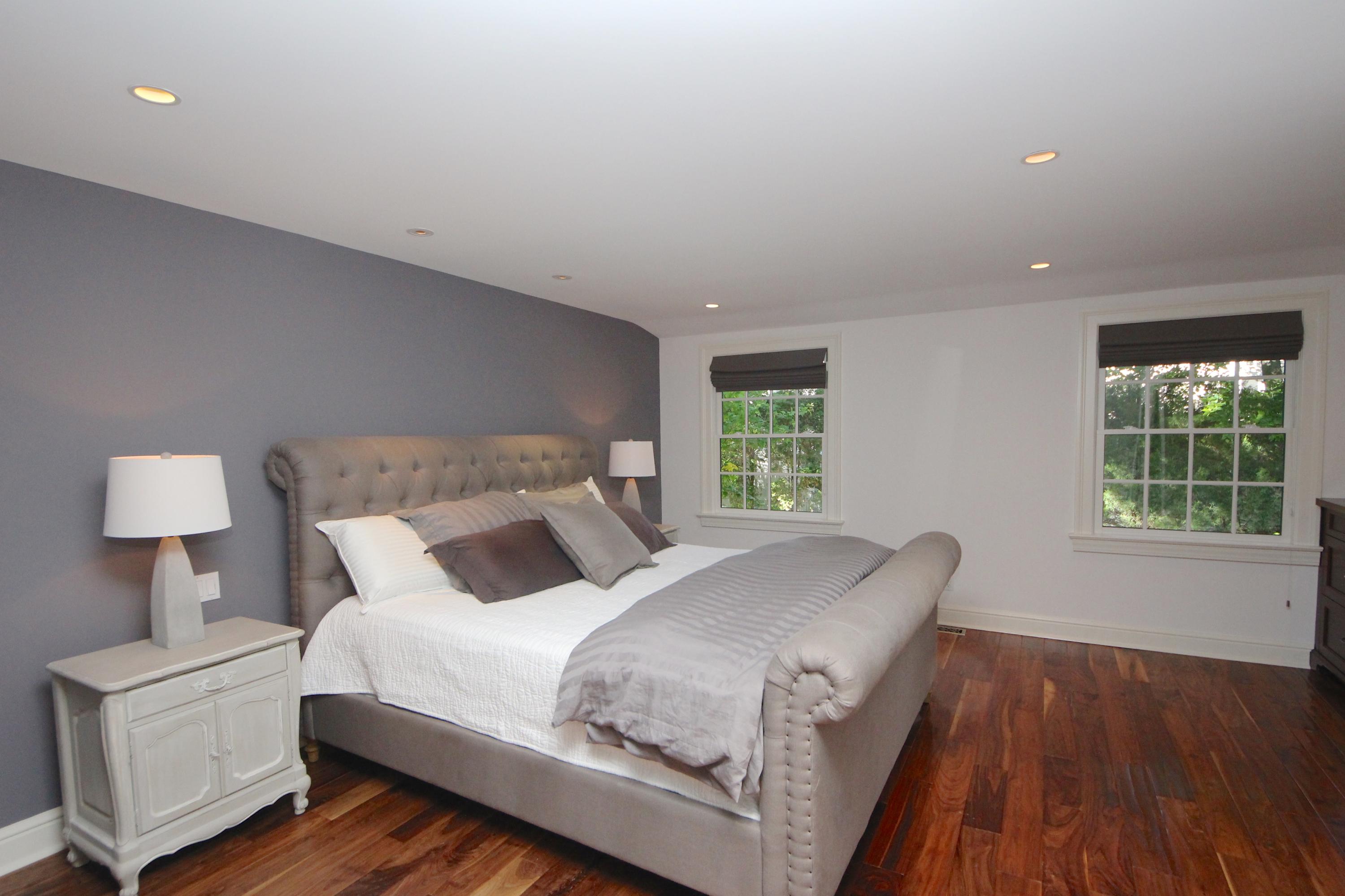 33 Intervale Road Darien, CT 06820 - Photo 11 of 28 a bedroom with a bed and a window