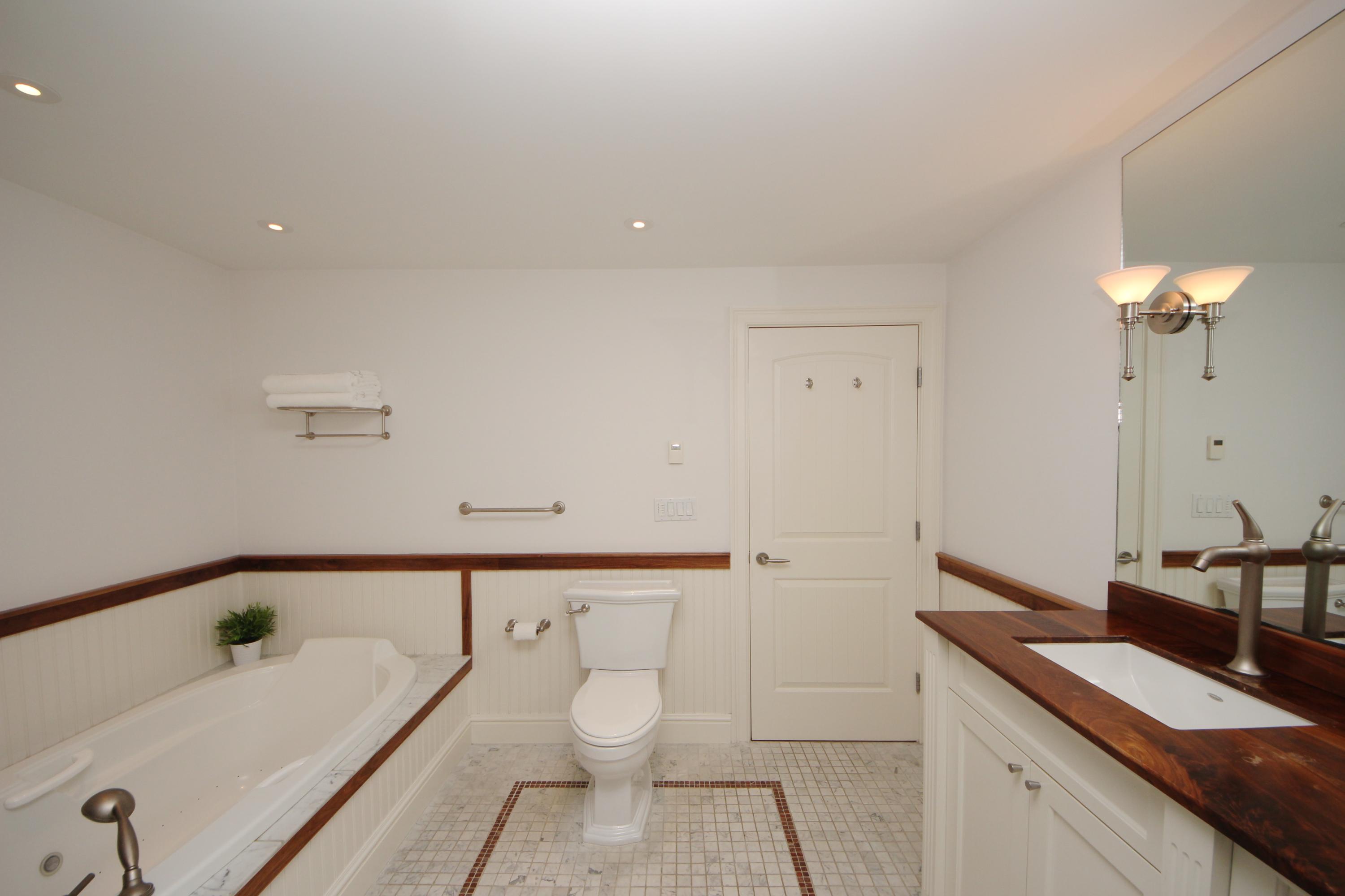33 Intervale Road Darien, CT 06820 - Photo 16 of 28 a bathroom with a granite countertop sink and a mirror
