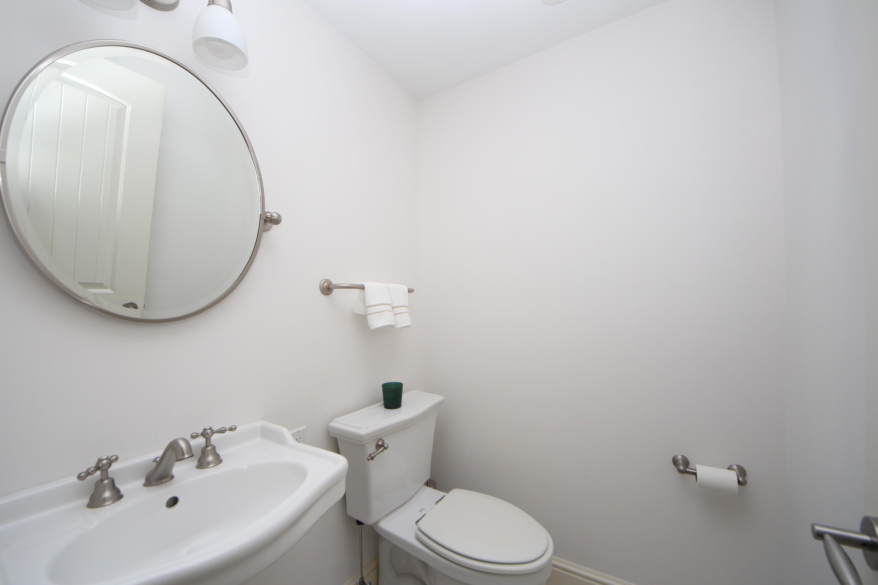 33 Intervale Road Darien, CT 06820 - Photo 17 of 28 a bathroom with a sink and a mirror