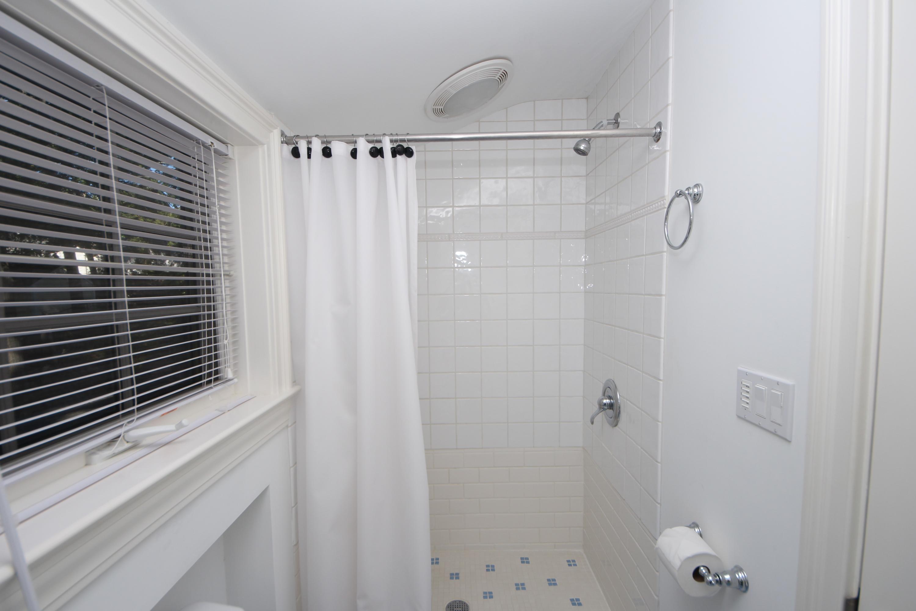 33 Intervale Road Darien, CT 06820 - Photo 20 of 28 a bathroom with a shower and a sink