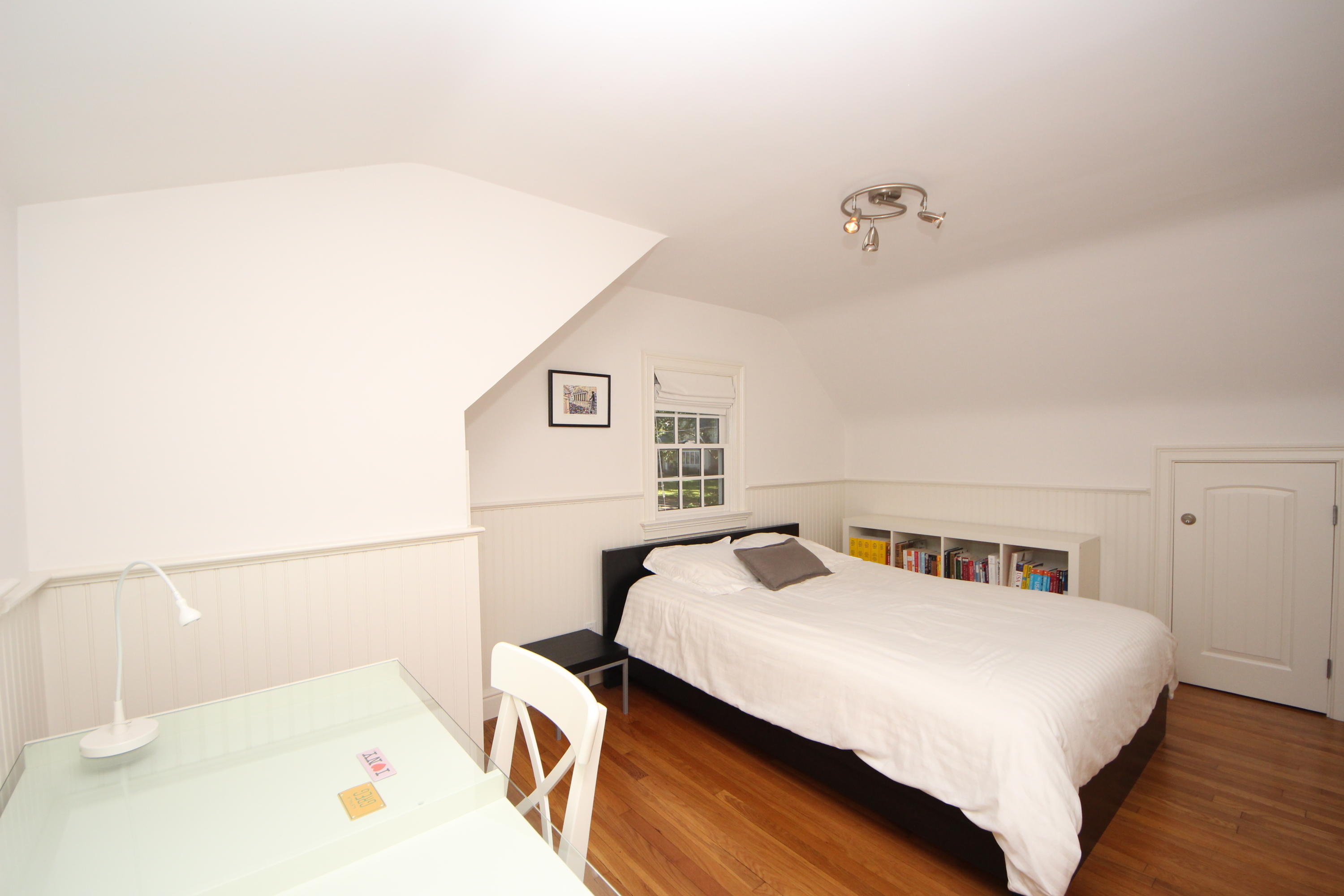 33 Intervale Road Darien, CT 06820 - Photo 22 of 28 a bedroom with a bed and a night stand