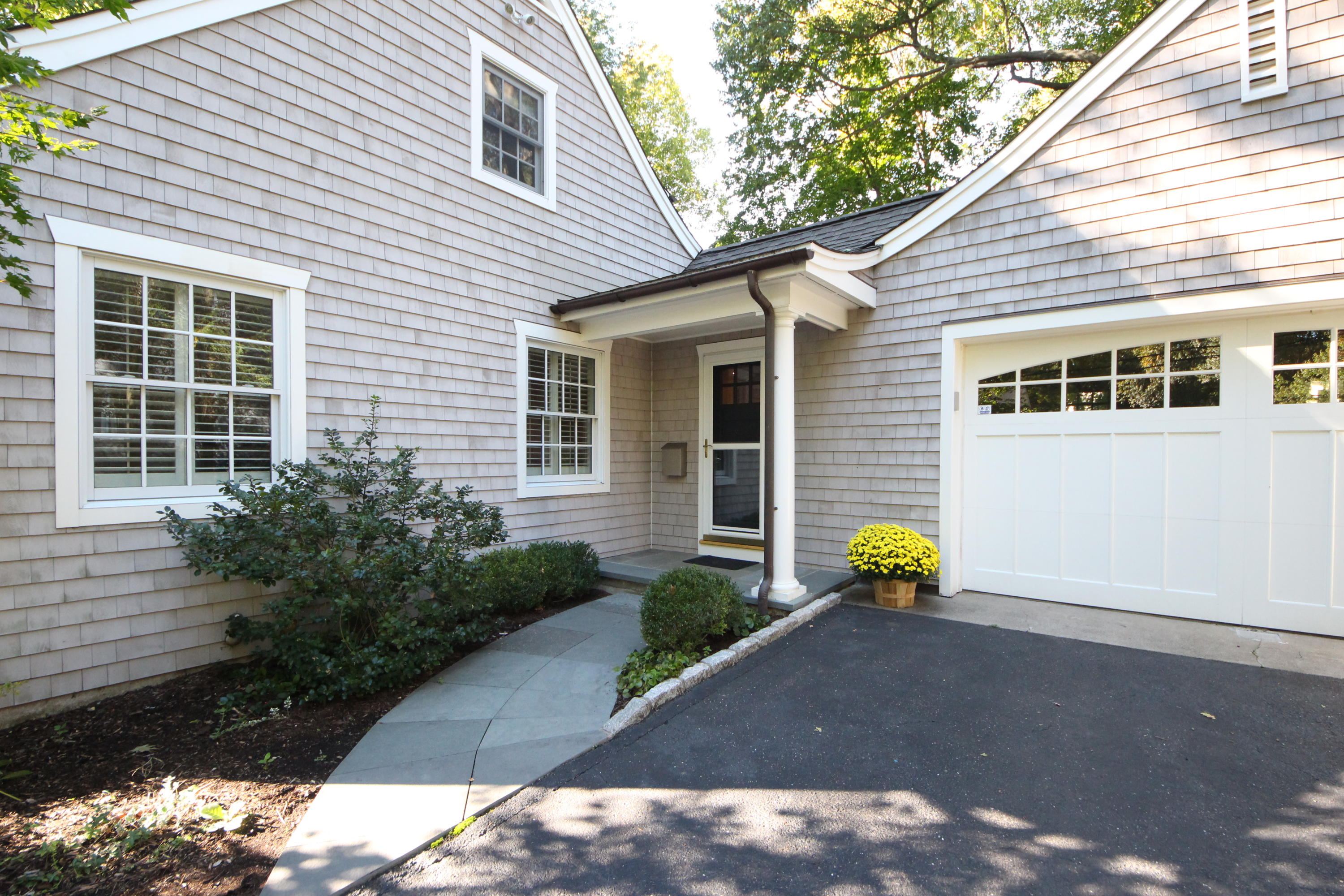 33 Intervale Road Darien, CT 06820 - Photo 24 of 28 a front view of a house with a garden