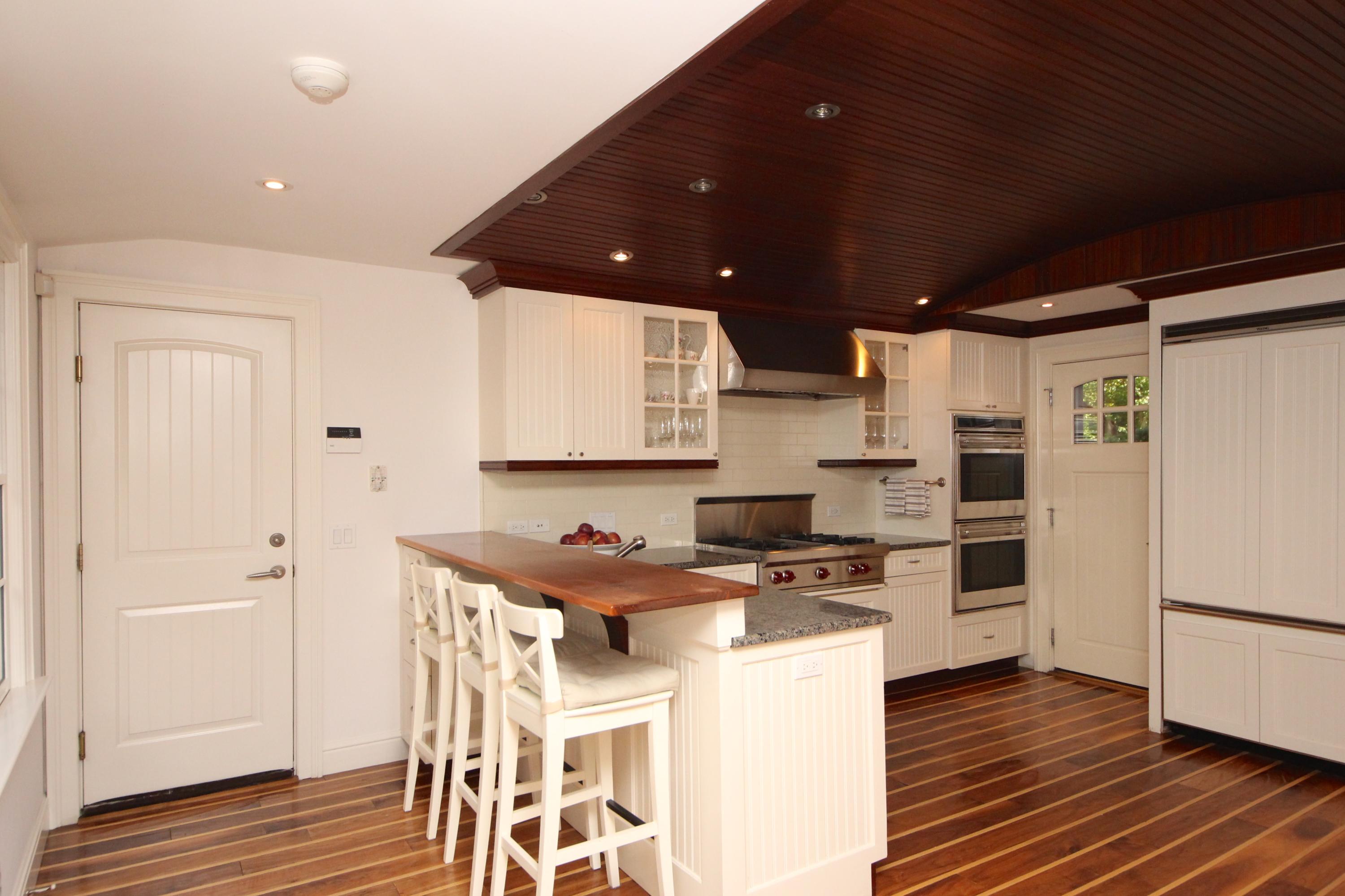 33 Intervale Road Darien, CT 06820 - Photo 6 of 28 a kitchen with stainless steel appliances a refrigerator and a stove top oven