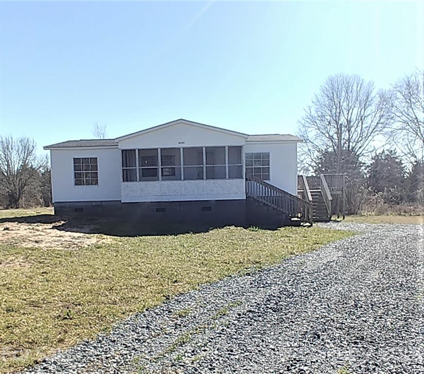 4335 Willis Hollis Road Edgemoor, SC 29712 - Photo 1 of 26 a front view of a house with a yard