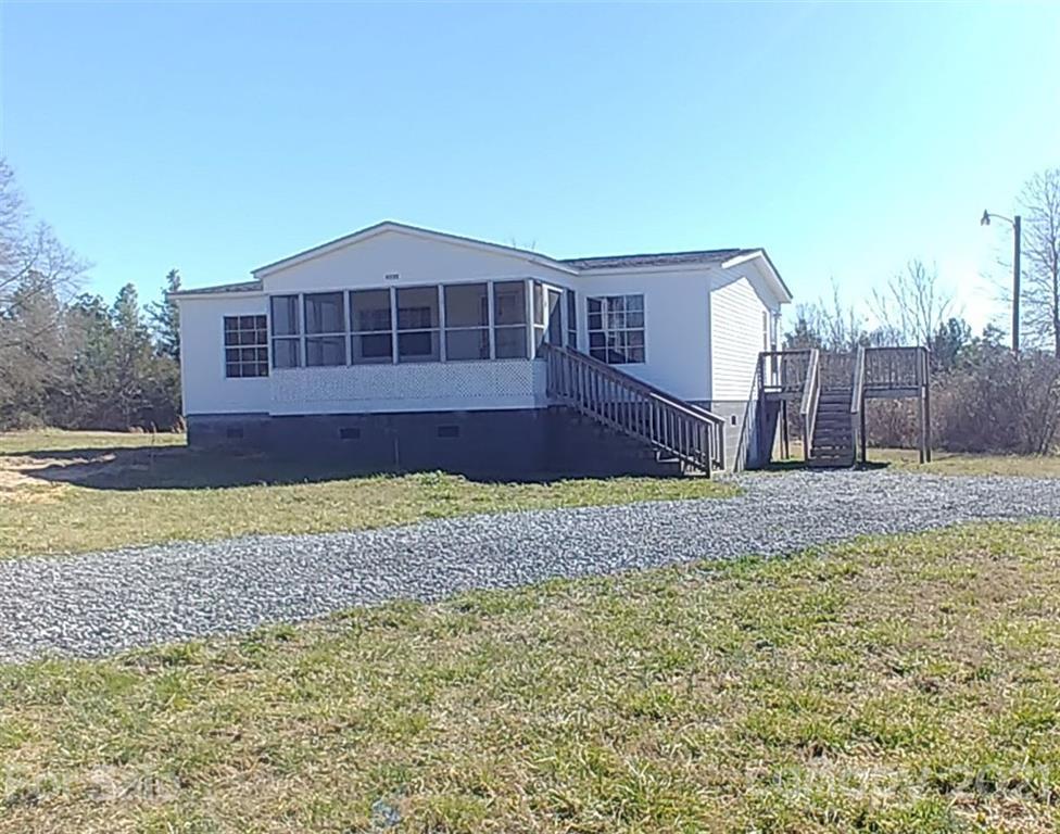 4335 Willis Hollis Road Edgemoor, SC 29712 - Photo 17 of 26 a front view of a house with a yard