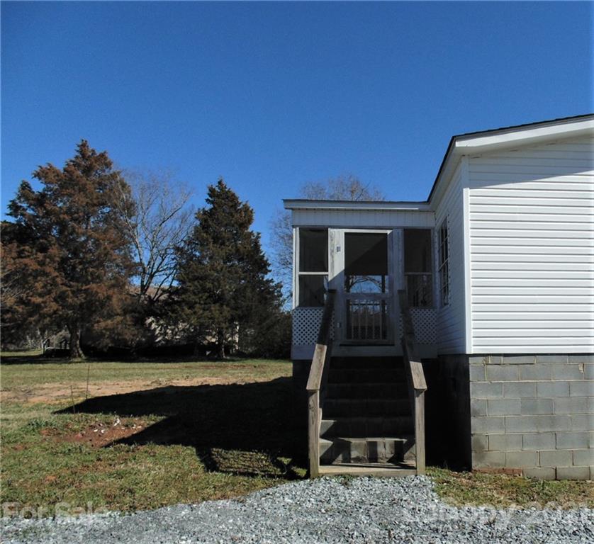 4335 Willis Hollis Road Edgemoor, SC 29712 - Photo 19 of 26 a front view of a house with garden