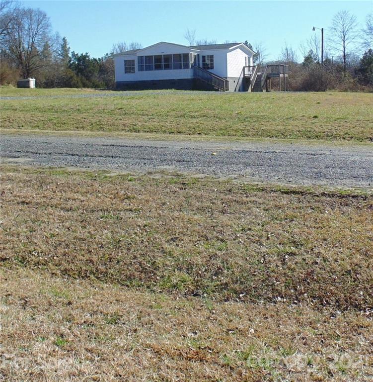 4335 Willis Hollis Road Edgemoor, SC 29712 - Photo 23 of 26 a view of a yard with an house
