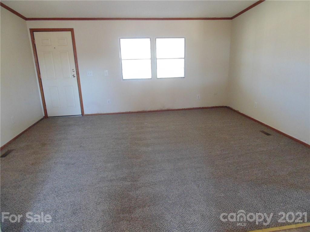 4335 Willis Hollis Road Edgemoor, SC 29712 - Photo 7 of 26 an empty room with a window