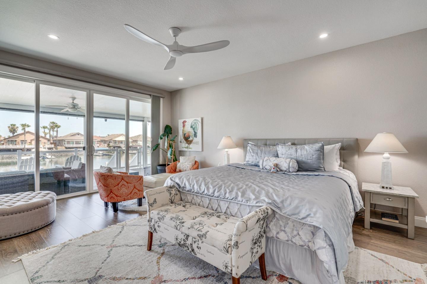 1944 Windward Point Discovery Bay, CA 94505 - Photo 13 of 43 a spacious bedroom with a bed and a large window