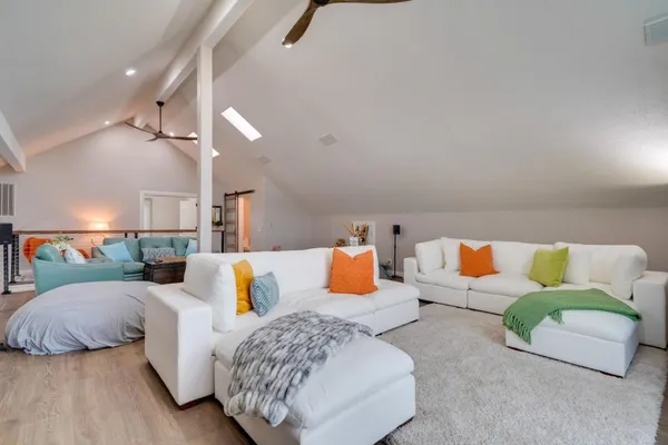 a living room with furniture and a couch
