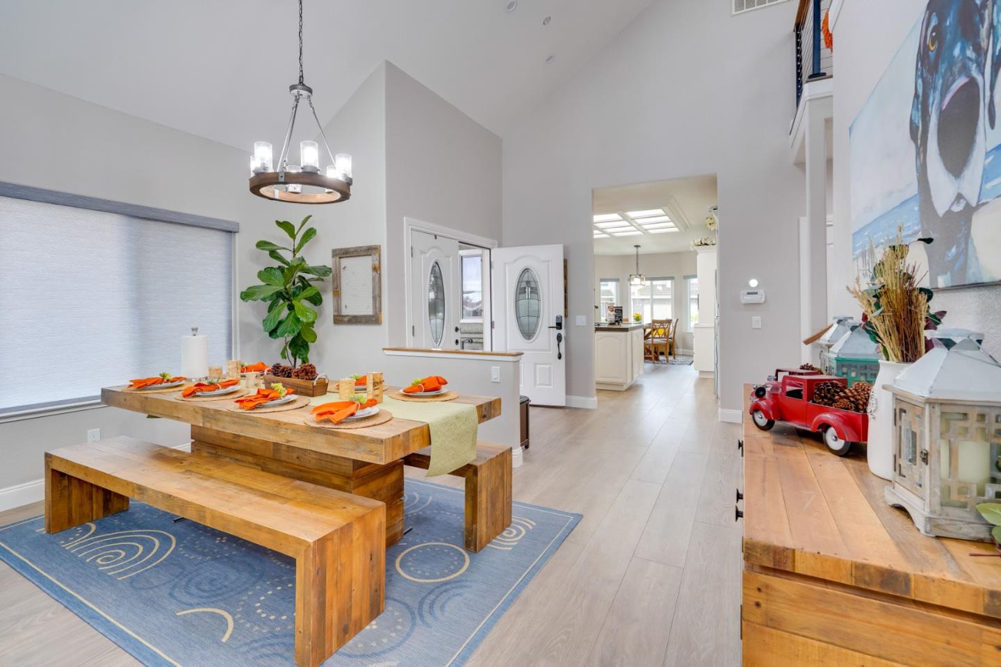1944 Windward Point Discovery Bay, CA 94505 - Photo 5 of 43 a view of a dining room and livingroom with furniture wooden floor a chandelier