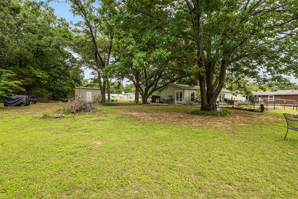 713 Midway Road Tool, TX 75143 - Photo 23 of 28 a view of swimming pool with trees