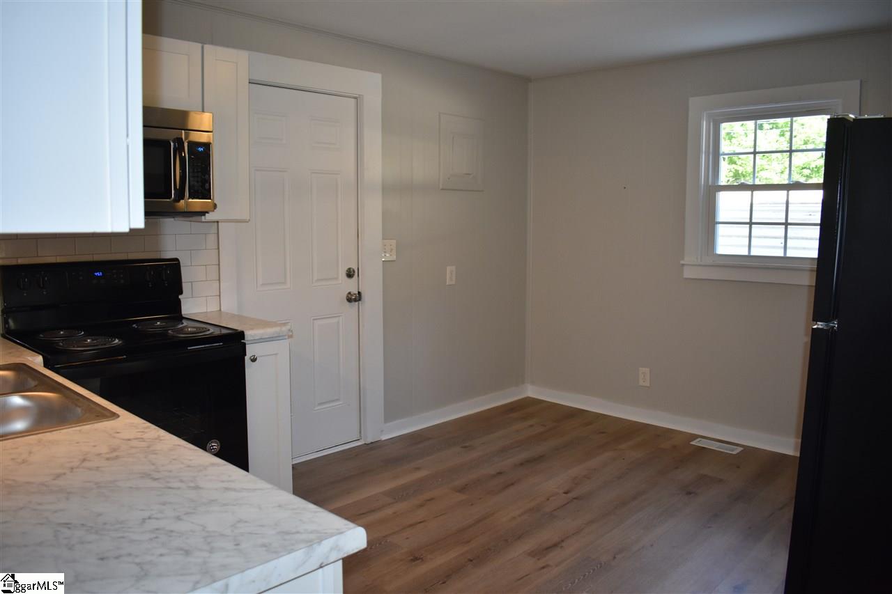 611 Booker Street Anderson, SC 29624 - Photo 18 of 19 space for dining table, door is to the back yard