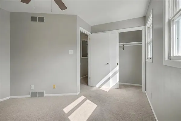 an empty room with windows