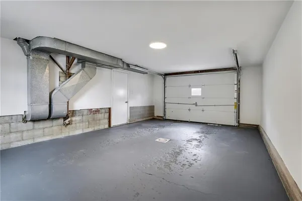a view of a garage with stairs