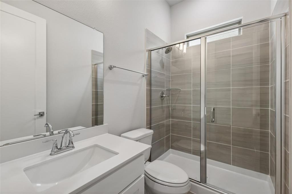 4421 Rustic Ridge Drive McKinney, TX 75071 - Photo 15 of 29 Downstairs Full Bathroom with Standing Shower