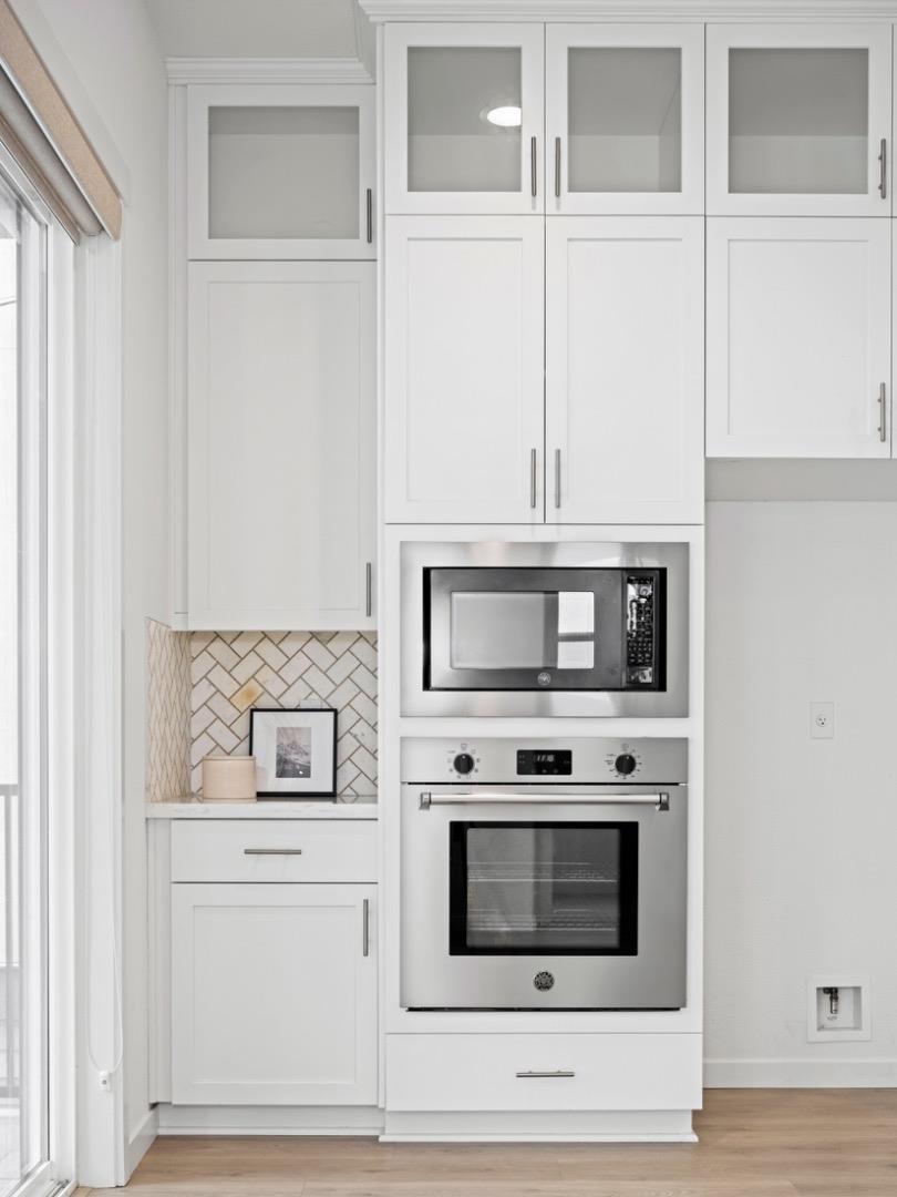 2149 Pastoral Loop San Jose, CA 95122 - Photo 15 of 46 a stove top oven sitting inside of a kitchen