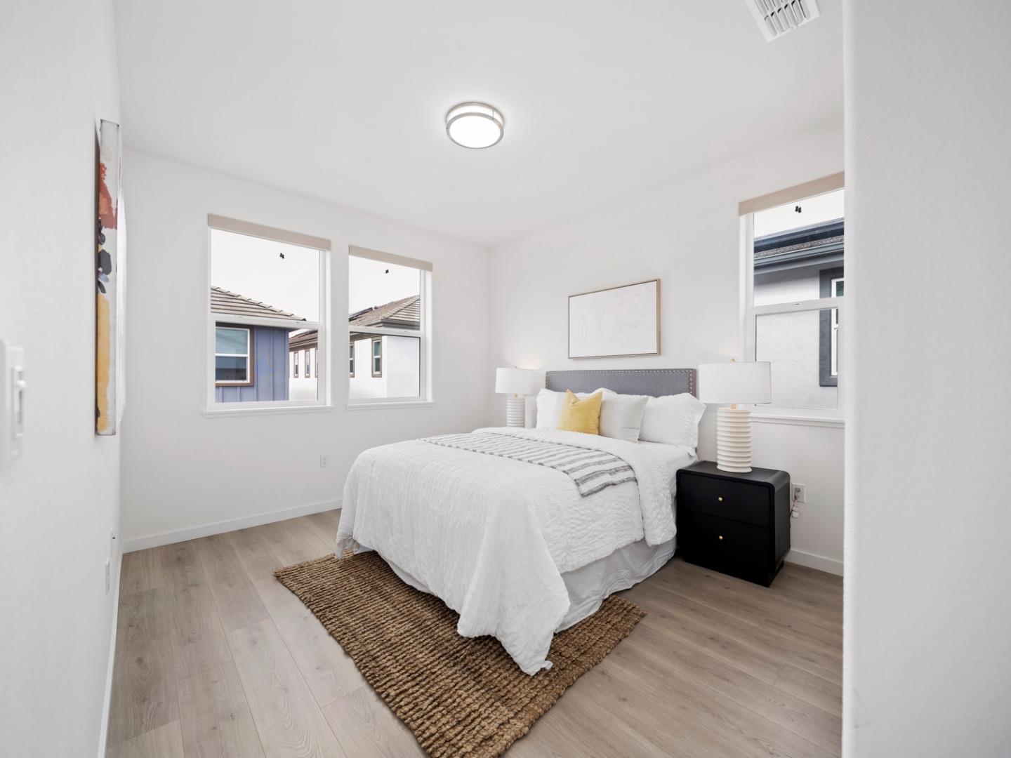 2149 Pastoral Loop San Jose, CA 95122 - Photo 19 of 46 a bedroom with a bed and wooden floor