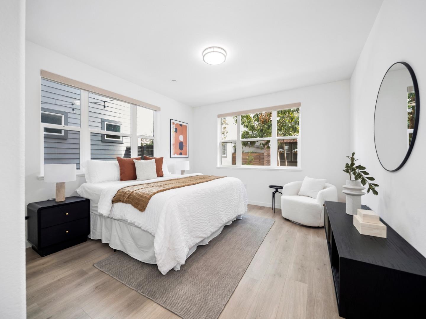 2149 Pastoral Loop San Jose, CA 95122 - Photo 23 of 46 a bed room with a bed and a large window