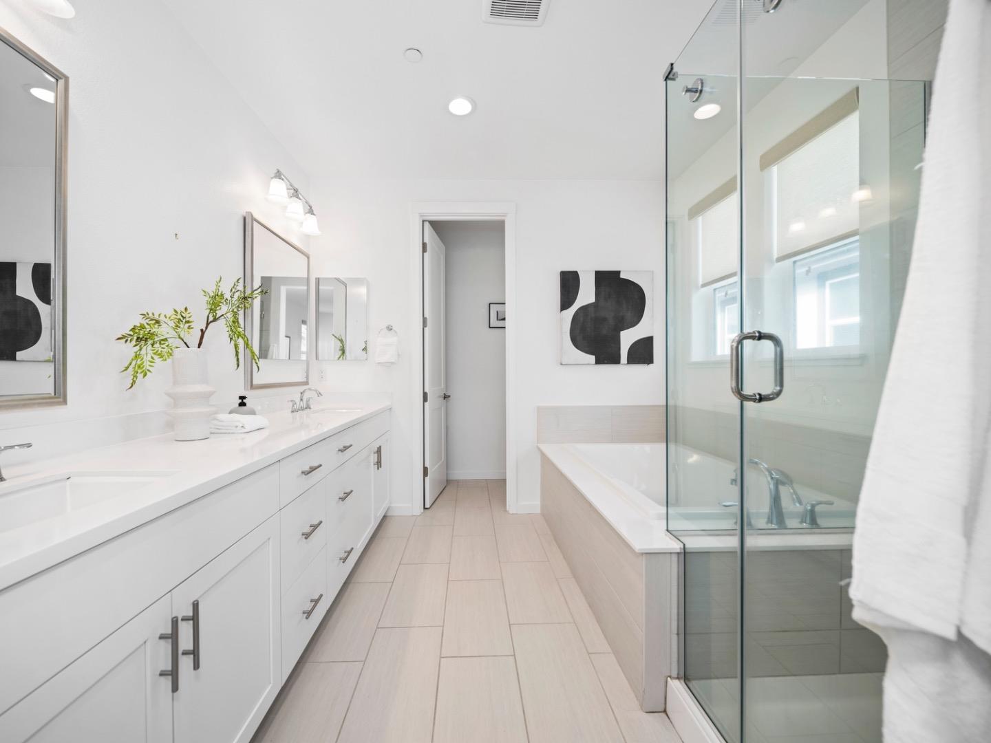 2149 Pastoral Loop San Jose, CA 95122 - Photo 27 of 46 a bathroom with a tub sink and mirror