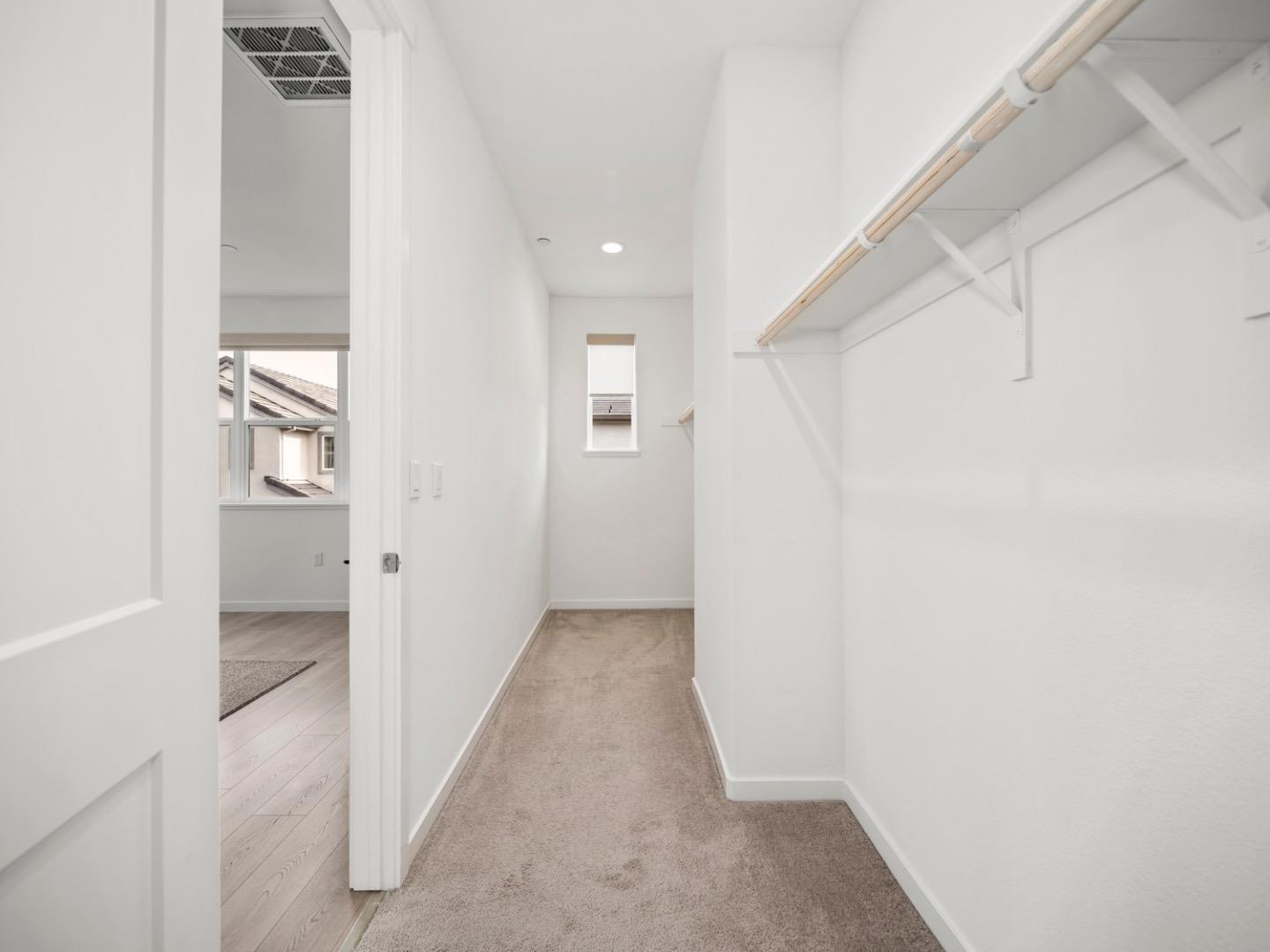 2149 Pastoral Loop San Jose, CA 95122 - Photo 29 of 46 a view of a hallway with wooden floor