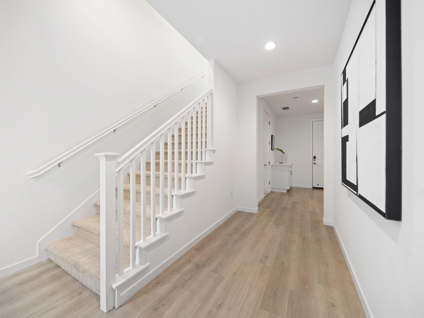 2149 Pastoral Loop San Jose, CA 95122 - Photo 30 of 46 a view of a hallway with wooden floor and entryway
