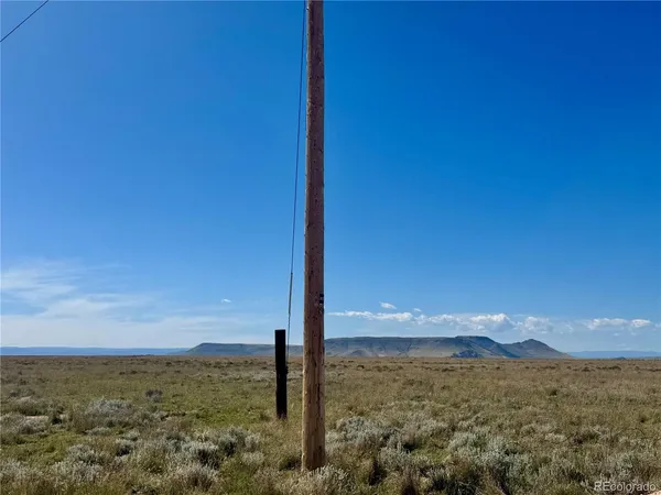 a view of ocean with a mountain