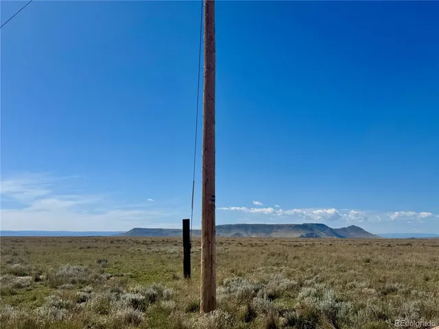 a view of ocean with a mountain