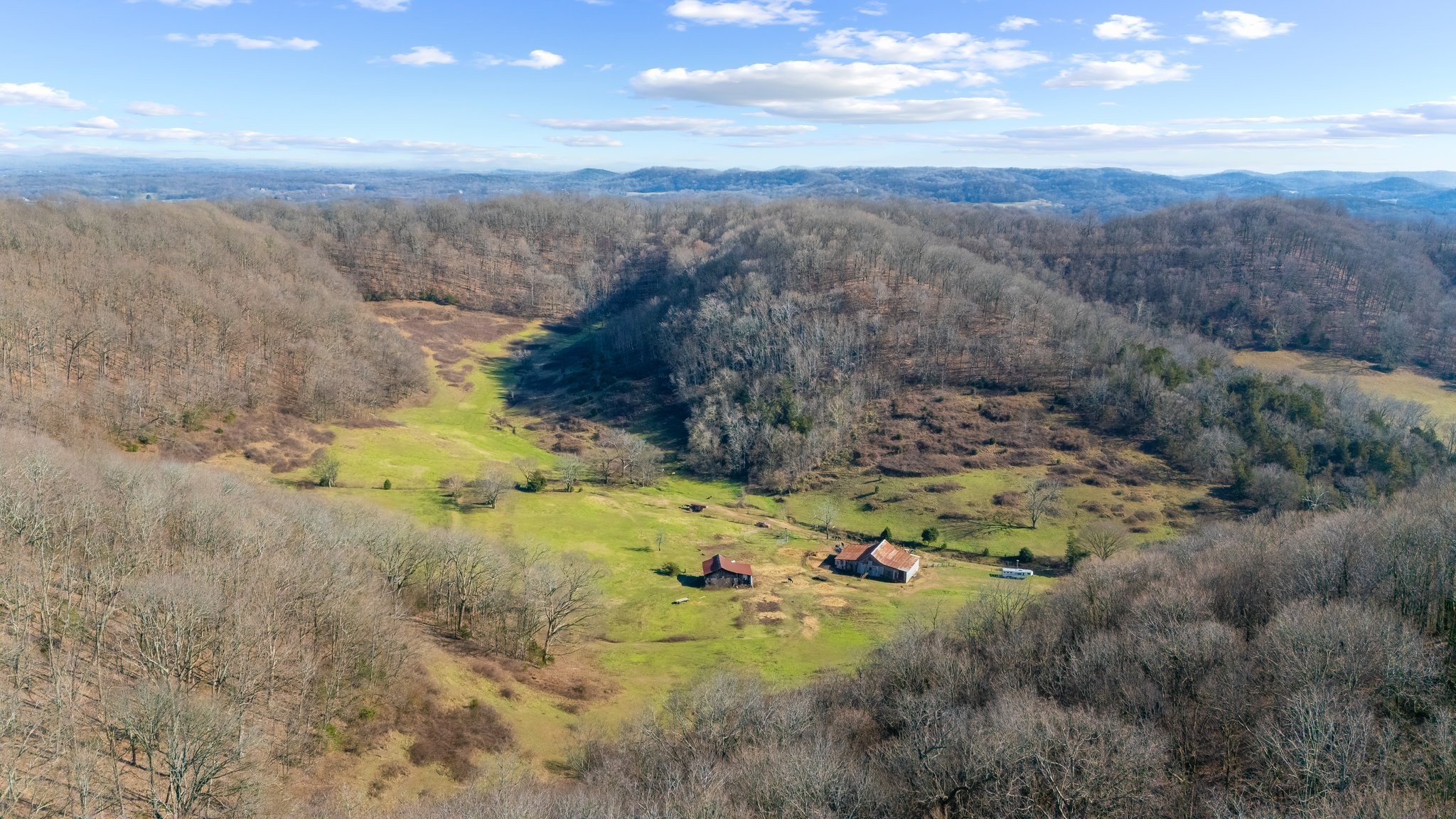 4701 Reed Road Thompson's Station, TN 37179 - Photo 6 of 27 a view of a lake with mountains in the background