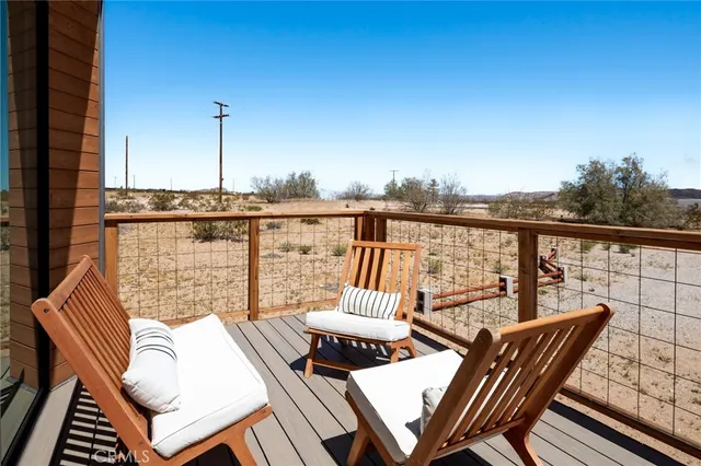 a view of a terrace with furniture and outdoor seating